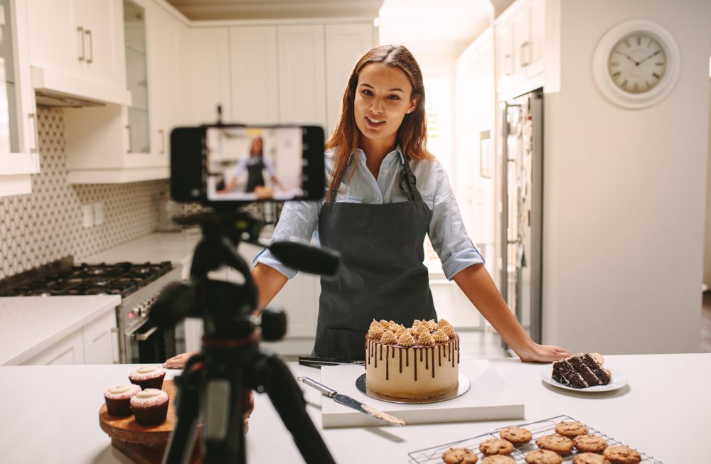 Woman filming her cooking channel